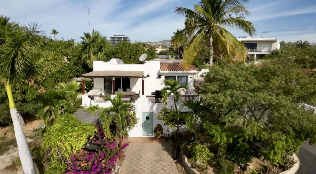 Los Cabos Cabo Bello Located in the desirable gated community of Cabo Bello, this duplex residence offers flexibility, privacy, and excellent income potential. Designed as two fully independent living spaces, the property features a total of five bedrooms, two kitchens, and two BBQ areas, ideal for large families or owners seeking to live in one unit while renting the other.One of Cabo Bello's standout features is its swimmable beach, one of the best in the Tezal area, just minutes away. Known for its security and peaceful atmosphere, the community offers gated access and 24/7 surveillance.Conveniently located near Fresko, Costco, Home Depot, and some of Cabo San Lucas' top restaurants, this property is perfect as a full-time residence, vacation home, or smart investment opportunity. – 119A Paseo de Los Cabos, Cabo Corridor, BS