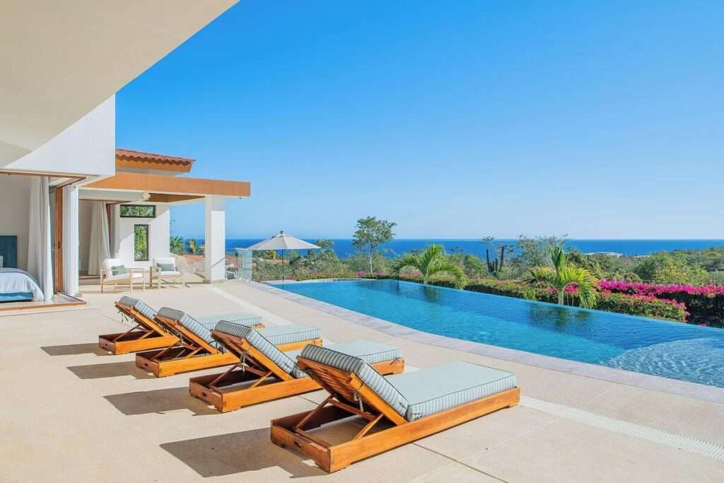 Los Cabos Villas Del Mar At Del Mar, homes are designed to feel calm, comfortable, and deeply personal. Each residence reflects the family who lives there—never a one-size-fits-all approach.Estate Villa 495 was thoughtfully tailored to embrace Cabo's natural rhythm and indoor-outdoor way of living. A complete redesign of the sun-filled pool deck brought new life to the home while preserving the memories already made. Set cliffside, just one row off the beach, the setting feels peaceful and expansive, where ocean air and open – 187 Padre Sistiaga, San Jose del Cabo, BS