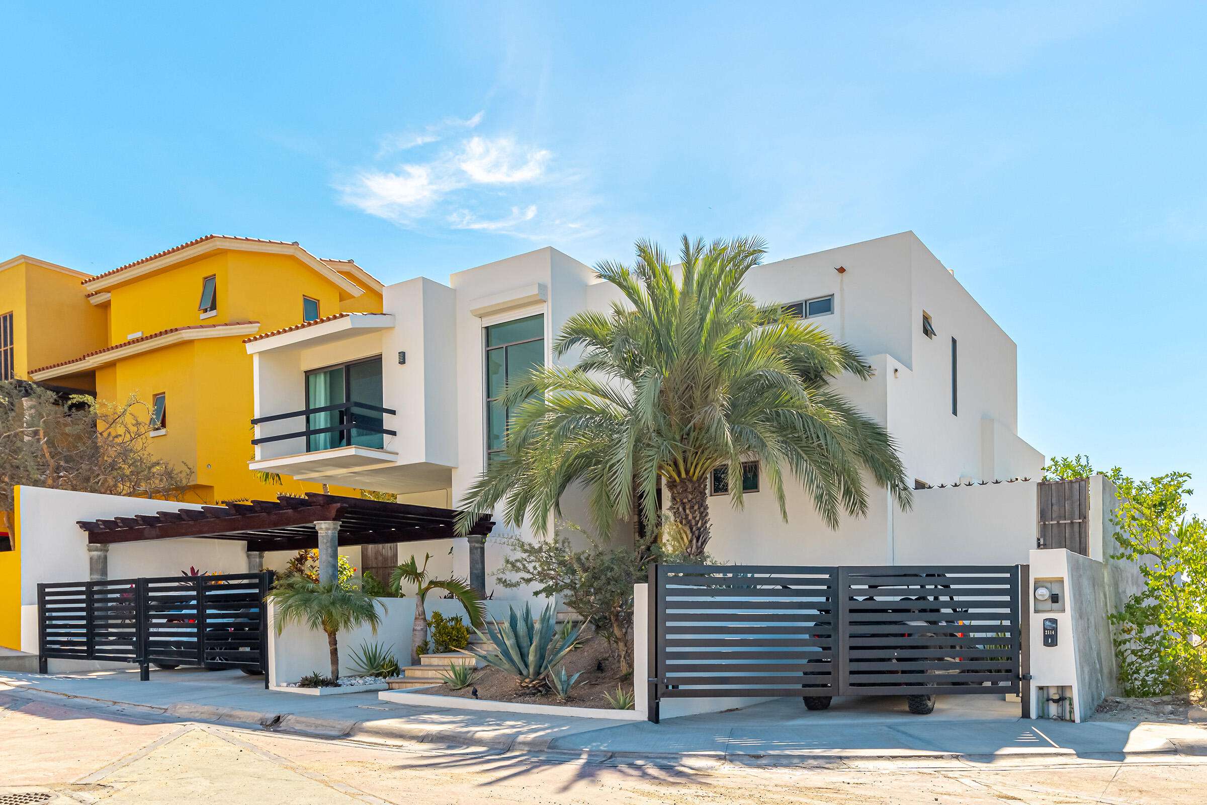 Los Cabos Finisterra This beautifully renovated family home in the established neighborhood of Fonatur Golf in San Jose offers an ideal blend of comfort and style. Situated on a quiet cul-de-sac, the spacious residence boasts four bedrooms, four bathrooms, and an exterior maid's quarters, providing ample room for everyone. Built in 2012, the home features a large TV or office space, a refreshing pool, a spa for relaxation, and an outdoor bar perfect for entertaining al fresco.The property is located on a 530 SM lot with for sale