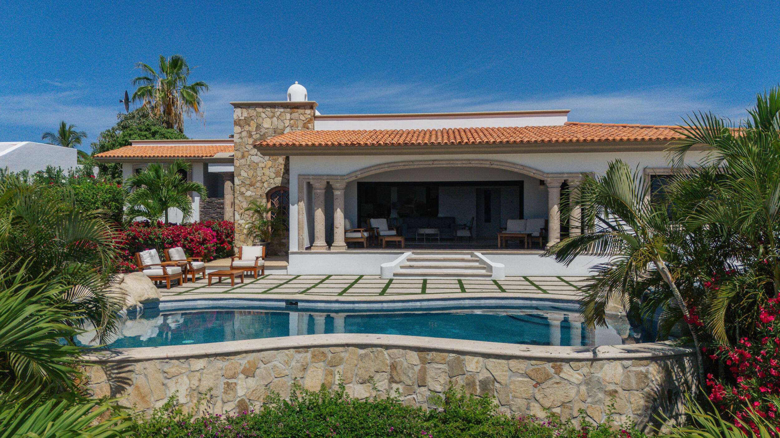 Los Cabos Lienzo Charro Experience coastal luxury in this contemporary home at next Quivira Golf Club, Los Cabos. Enjoy your private pool, beautiful garden, and spacious terrace under the Baja California sun.Just 35 minutes from Los Cabos International Airport, 12 minutes from local amenities, and a 5-minute walk to the beach. The community offers a golf club, exclusive amenities, and easy access to shopping.Parking for 2 vehiclesNatural materials facade blending with the landscapeTotal area: 455 mΒ² (315 mΒ² living, 300 mΒ² gardens)Luxurious interiors:Equipped kitchen with islandOpen concept with built-in furniture1 master and 3 secondary bedrooms, each with bath and walk-in closetAmple lighting throughoutExteriorsCovered terrace with golf course for sale