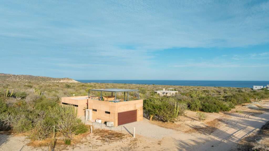 Los Cabos Fundadores Villa Maralta 62 offers contemporary coastal living in Puerto Los Cabos.This newly built 5-bedroom residence is designed around seamless indoor-outdoor flow, with main living areas opening toward the terrace, pool, and ocean – Camino del Sol, Pacific, BS