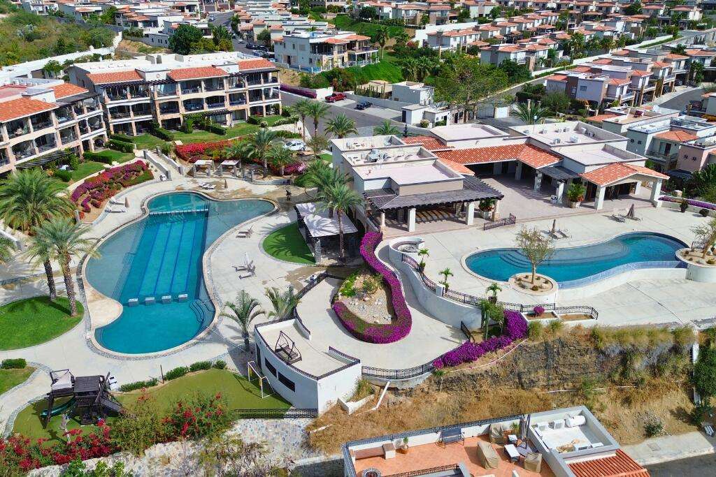Los Cabos Cabo Bello Located in the desirable gated community of Cabo Bello, this duplex residence offers flexibility, privacy, and excellent income potential. Designed as two fully independent living spaces, the property features a total of five bedrooms, two kitchens, and two BBQ areas, ideal for large families or owners seeking to live in one unit while renting the other.One of Cabo Bello's standout features is its swimmable beach, one of the best in the Tezal area, just minutes away. Known for its security and peaceful atmosphere, the community offers gated access and 24/7 surveillance.Conveniently located near Fresko, Costco, Home Depot, and some of Cabo San Lucas' top restaurants, this property is perfect as a full-time residence, vacation home, or smart investment opportunity. for sale