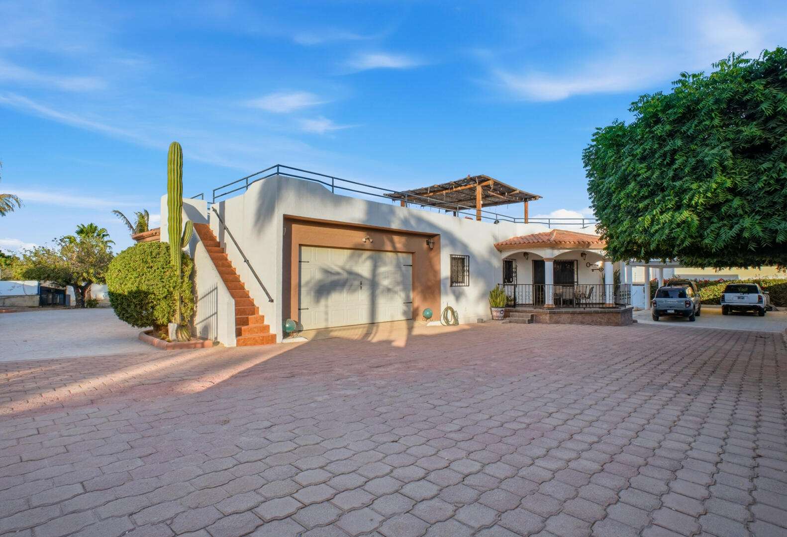 Los Cabos Finisterra SEE PRIVATE REMARKS TO TOUR !58 Paseo Finistera rests on Over 1/3 acre Corner lot.Finistera is San Jose's most sought after private neighborhood. Close to downtown.A spacious 4 bedroom, 5 full baths home. Including two Casitas one casita offers a second kitchen!A solid rock wall surrounds the property.This 4,000 square foot custom built resorthome offers 14 foot high soaring ceilings throughout.The entry offers a 15 foot high dome ceiling,for light. Mature cactus landscaping, plus graceful terraces surround the large pool and jacuzzi.The circular stone fire pit area surrounded with built in benches has spacious seating.Full bathroom with shower located outside in yard area.Large laundry room with storage for sale