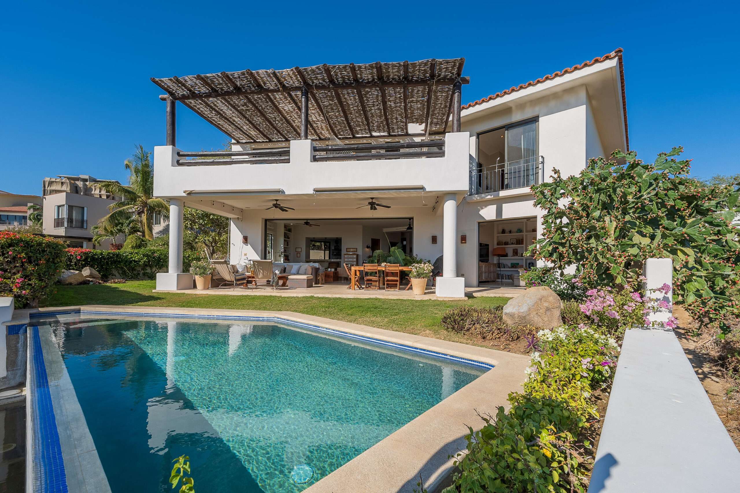 Los Cabos Lienzo Charro Experience coastal luxury in this contemporary home at next Quivira Golf Club, Los Cabos. Enjoy your private pool, beautiful garden, and spacious terrace under the Baja California sun.Just 35 minutes from Los Cabos International Airport, 12 minutes from local amenities, and a 5-minute walk to the beach. The community offers a golf club, exclusive amenities, and easy access to shopping.Parking for 2 vehiclesNatural materials facade blending with the landscapeTotal area: 455 mΒ² (315 mΒ² living, 300 mΒ² gardens)Luxurious interiors:Equipped kitchen with islandOpen concept with built-in furniture1 master and 3 secondary bedrooms, each with bath and walk-in closetAmple lighting throughoutExteriorsCovered terrace with golf course for sale
