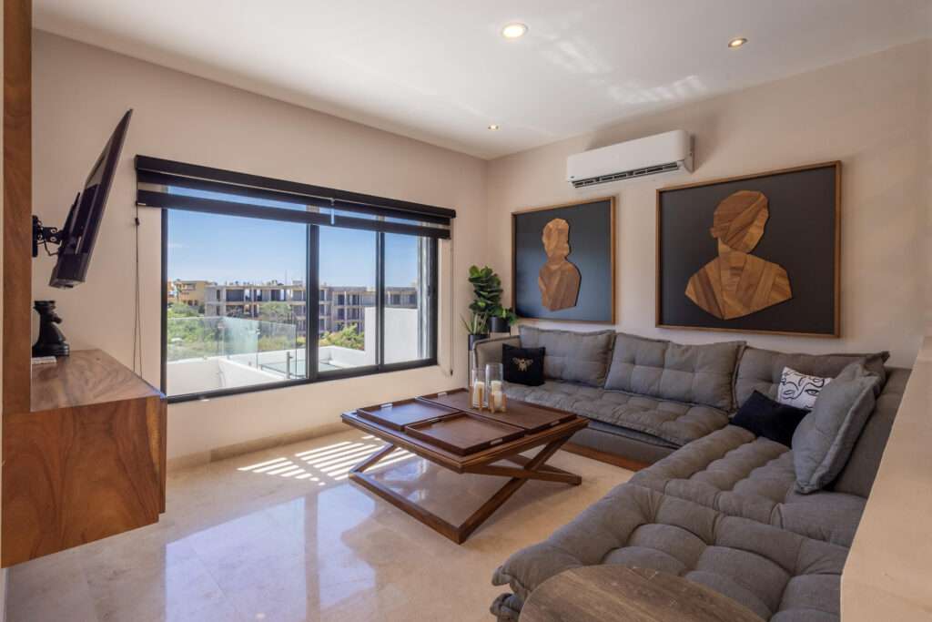 Los Cabos Chamizal Live or invest smart in this versatile 3-bedroom, 3-bath property in San José del Cabo. Featuring two fully independent units: a 1-bedroom studio with full kitchen, private bath, laundry area, and separate entrance; and a spacious 2-bedroom, 2-bath unit with its own kitchen, laundry room, and entrance. Both are fully furnished and equipped with air conditioning. Ideal to live in one and rent the other short or long term. Located in a safe, desirable neighborhood loved by locals and expats. Just minutes from the beach, shops, and restaurants — with a rooftop terrace offering stunning ocean – Cumbres del Tezal 30A, Cabo Corridor, Cabo Corridor, BS