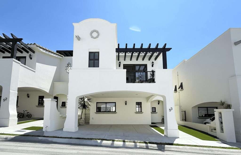 Los Cabos Las Misiones Exclusive community in El Tezal, just minutes from the beach, the Cabo Marina, and Cosco. Phase II offers only 39 homes and aclubhouse with pool, jacuzzi, gym, and social areas. The San Bernardino model features 2 levels plus a rooftop deck: open living/dining, quartzkitchen with appliances, half bath, and spacious patio. Upstairs: 3 bedrooms, 2 baths, laundry. The primary suite includes a front terrace overlookingthe community. Rooftop deck is ideal for sunsets and gatherings. Covered parking for 2, high-end finishes, closets, marble vanities, and AC minisplits included. Select homes ready for immediate delivery. – Las Misiones, Cabo Corridor, BS