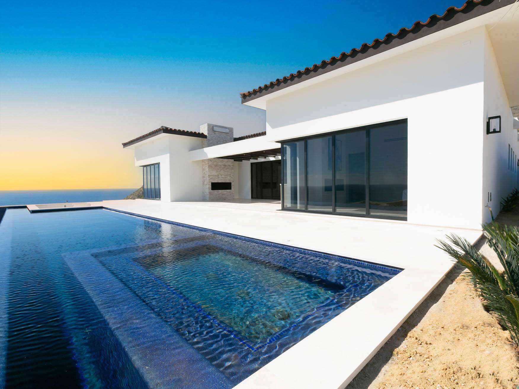 Los Cabos Copala Lot 40 is a stunning two-story residence featuring dual primary suites on the upper level, offering expansive Pacific Ocean for sale