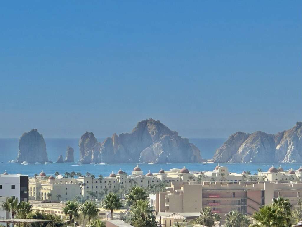 Los Cabos Chamizal Live or invest smart in this versatile 3-bedroom, 3-bath property in San José del Cabo. Featuring two fully independent units: a 1-bedroom studio with full kitchen, private bath, laundry area, and separate entrance; and a spacious 2-bedroom, 2-bath unit with its own kitchen, laundry room, and entrance. Both are fully furnished and equipped with air conditioning. Ideal to live in one and rent the other short or long term. Located in a safe, desirable neighborhood loved by locals and expats. Just minutes from the beach, shops, and restaurants — with a rooftop terrace offering stunning ocean – Maranata Villa 26, Cabo Corridor, BS
