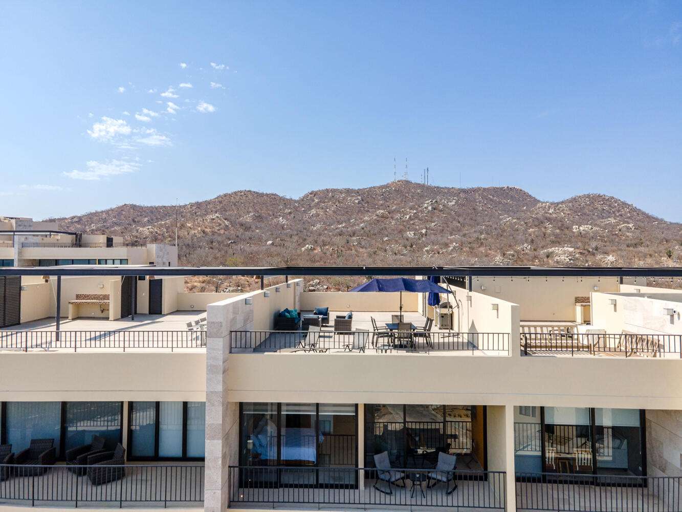 Los Cabos Solaria Welcome to Solaria Penthouse C-403, a stylish two-bedroom condo in El Tezal that offers both comfort and flexibility. Delivered turnkey, it's ready to enjoy or operate as a high-performing Airbnb. The private rooftop terrace features unobstructed for sale