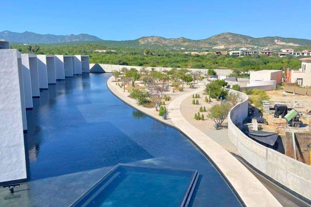 Los Cabos Dunna Welcome to Dunna - A New Standard of Luxury in Cabo. More than a residence, Dunna is a vibrant, fully integrated community where luxury, culture, and recreation converge. Designed by renowned architect Sordo Madaleno, this visionary development seamlessly blends timeless elegance with natural tranquility, offering meticulously crafted residences and garden villas complemented by world-class amenities. Elevated Living, Unmatched Experiences Choose from 13 thoughtfully designed floor plans from 2 - 5 bedrooms ranging from 1,475 - 6,458 sq. ft., featuring seamless indoor-outdoor living, elegant finishes, private rooftops, Jacuzzis, and lush garden terraces. Resort-Style AmenitiesEnjoy unparalleled amenities, including:" Infinity pools (Adults-only, Family, Kids & Oasis)" State-of-the-art wellness & fitness center" Luxury spa (sauna, steam, ice baths, massage suites)" Exclusive rooftop lounges & panoramic – Sunrise, Cora 301d, San Jose del Cabo, San Jose del Cabo, BS