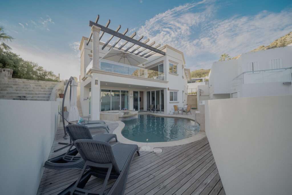Los Cabos Lienzo Charro Experience coastal luxury in this contemporary home at next Quivira Golf Club, Los Cabos. Enjoy your private pool, beautiful garden, and spacious terrace under the Baja California sun.Just 35 minutes from Los Cabos International Airport, 12 minutes from local amenities, and a 5-minute walk to the beach. The community offers a golf club, exclusive amenities, and easy access to shopping.Parking for 2 vehiclesNatural materials facade blending with the landscapeTotal area: 455 m² (315 m² living, 300 m² gardens)Luxurious interiors:Equipped kitchen with islandOpen concept with built-in furniture1 master and 3 secondary bedrooms, each with bath and walk-in closetAmple lighting throughoutExteriorsCovered terrace with golf course – Villa Montana, Cabo San Lucas, Cabo San Lucas, BS