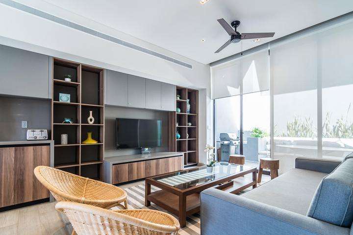 Los Cabos The Paraiso Residences Beautiful Condo located in The Paraiso Residences, a modern new complex of luxury condominiums located at Puerto Paraiso Mall. In the middle of the Cabo San Lucas Marina, known to host ultra luxury yachts, one of the biggest sport fishing annual competitions ''Bisbee's'', plus plenty of restaurants for early breakfast or fine dining, as well as the top Cabo night spots. This Condo features modern decoration in perfectly illuminated spaces, kitchen fully equipped. A spacious and fun living room perfect to entertain and relax, with a comfortable couch that can make extra sleeping space. Two well sized bedrooms, Master with King size bed and ensuite shower bathroom as well, both with spacious closet space. The living room pocket doors open to extend your social area to the exterior terrace with BBQ and dining for six. Enjoy the roof top private terrace with a wonderful jacuzzi, lounge beds to soak in the sun or admire the Baja skylights – Blvd. Lázaro Cárdenas, Cabo San Lucas, BS